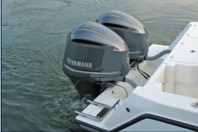 Twin Yamaha outboard motors on a boat.