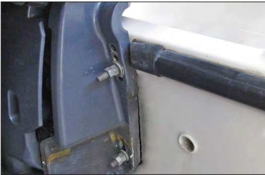 Boat engine mount with fittings and connections.